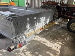 REMOLQUE EN BATEA DE DOBLE EJE lleno