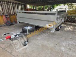 REMOLQUE EN BATEA DE DOBLE EJE lleno