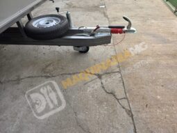 REMOLQUE EN BATEA DE DOBLE EJE lleno