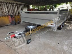 REMOLQUE EN BATEA DE DOBLE EJE lleno