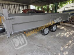 REMOLQUE EN BATEA DE DOBLE EJE lleno