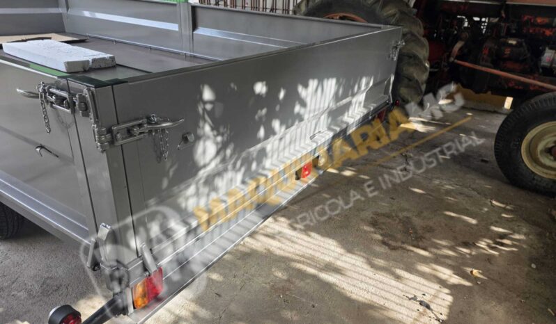 REMOLQUE EN BATEA DE DOBLE EJE lleno