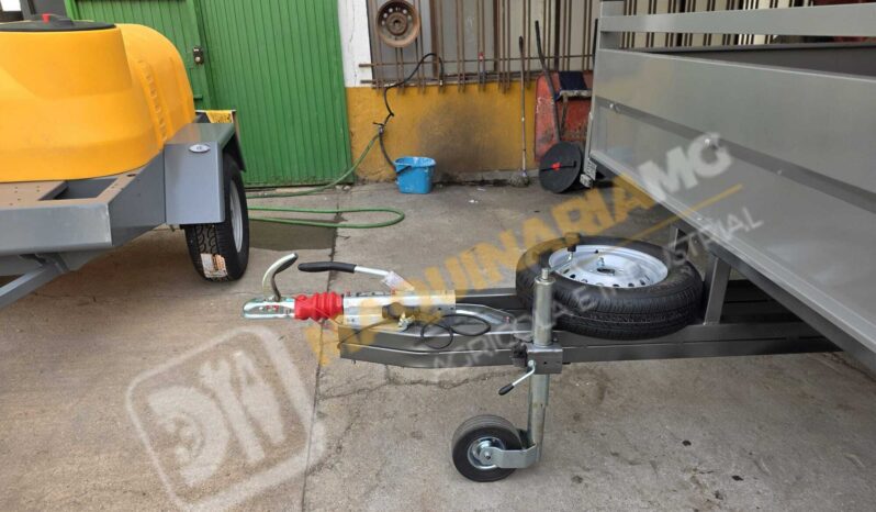 REMOLQUE EN BATEA DE DOBLE EJE lleno