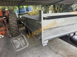 REMOLQUE EN BATEA DE DOBLE EJE lleno
