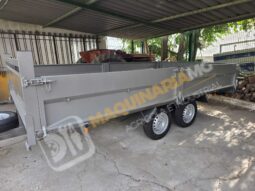 REMOLQUE EN BATEA DE DOBLE EJE lleno
